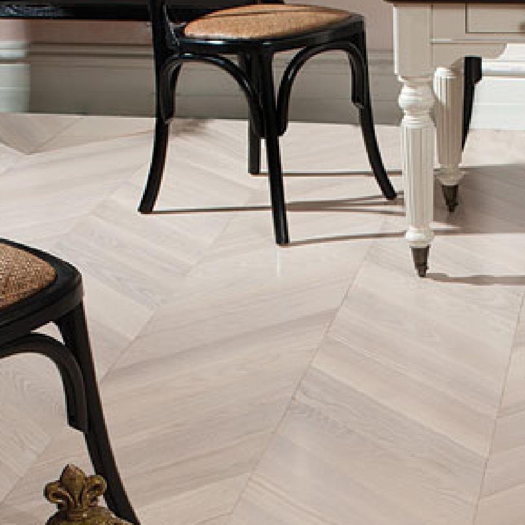Custom glue-down herringbone and parquet flooring installation in West Vancouver, BC
