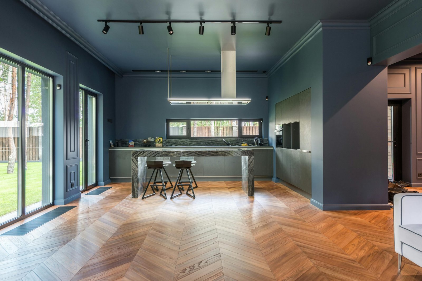 Professional glue-down installation of premium hardwood chevron and herringbone parquet flooring in New Westminster, BC